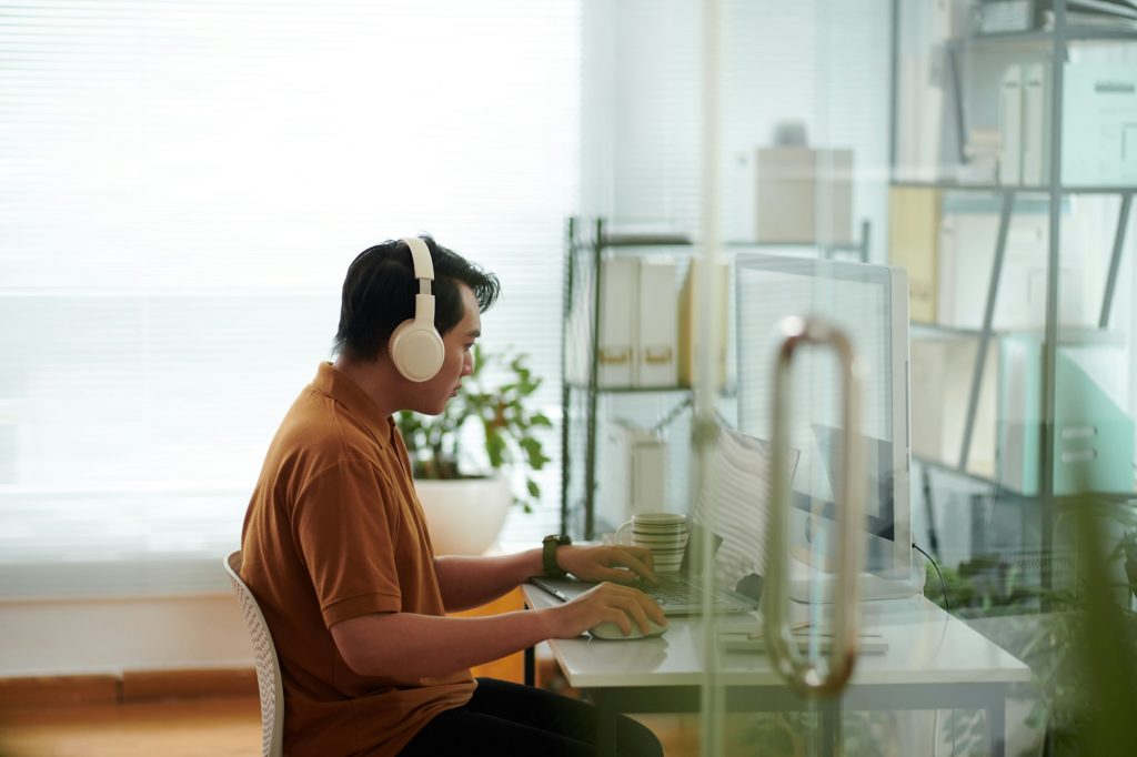 Man with Disability Working on Computer