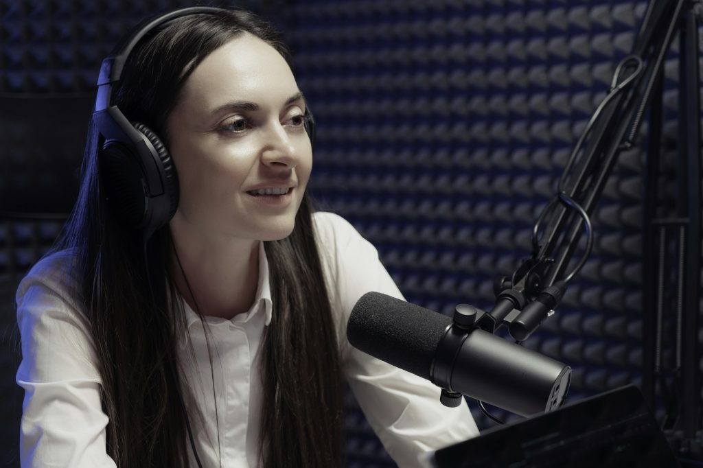 Podcaster Sharing Stories On Air